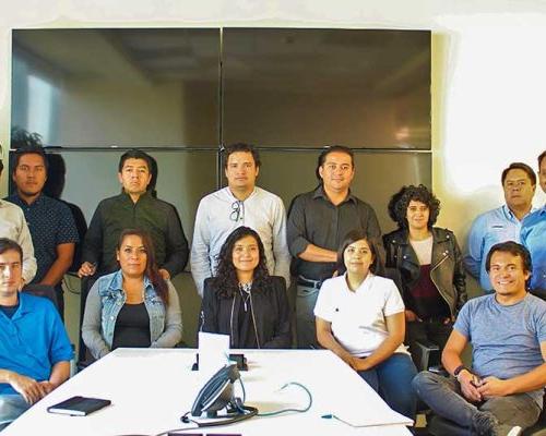 Interior of Mexico City office workstations and team members